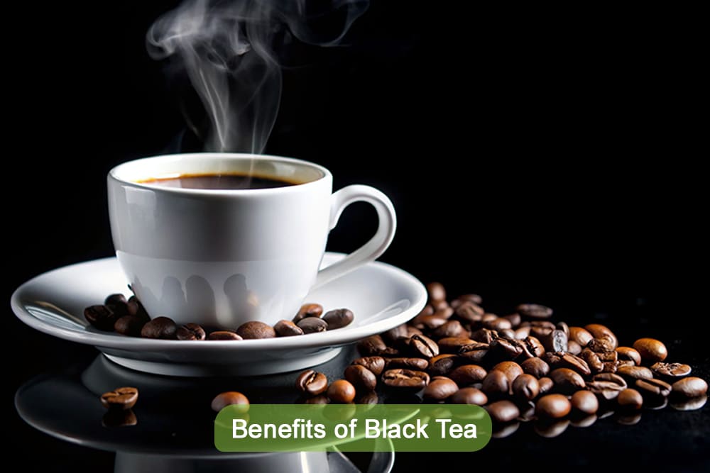 A steaming cup of black tea in a white cup surrounded by coffee beans on a reflective black background