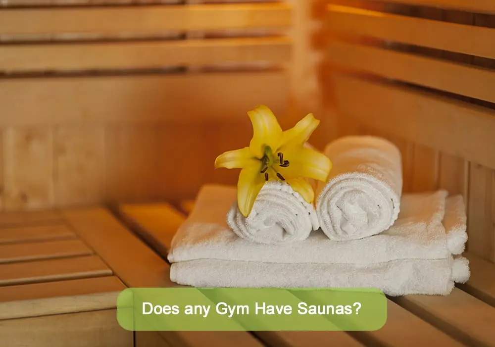 Towels and a yellow flower in a wooden sauna, showcasing a relaxing post-workout experience